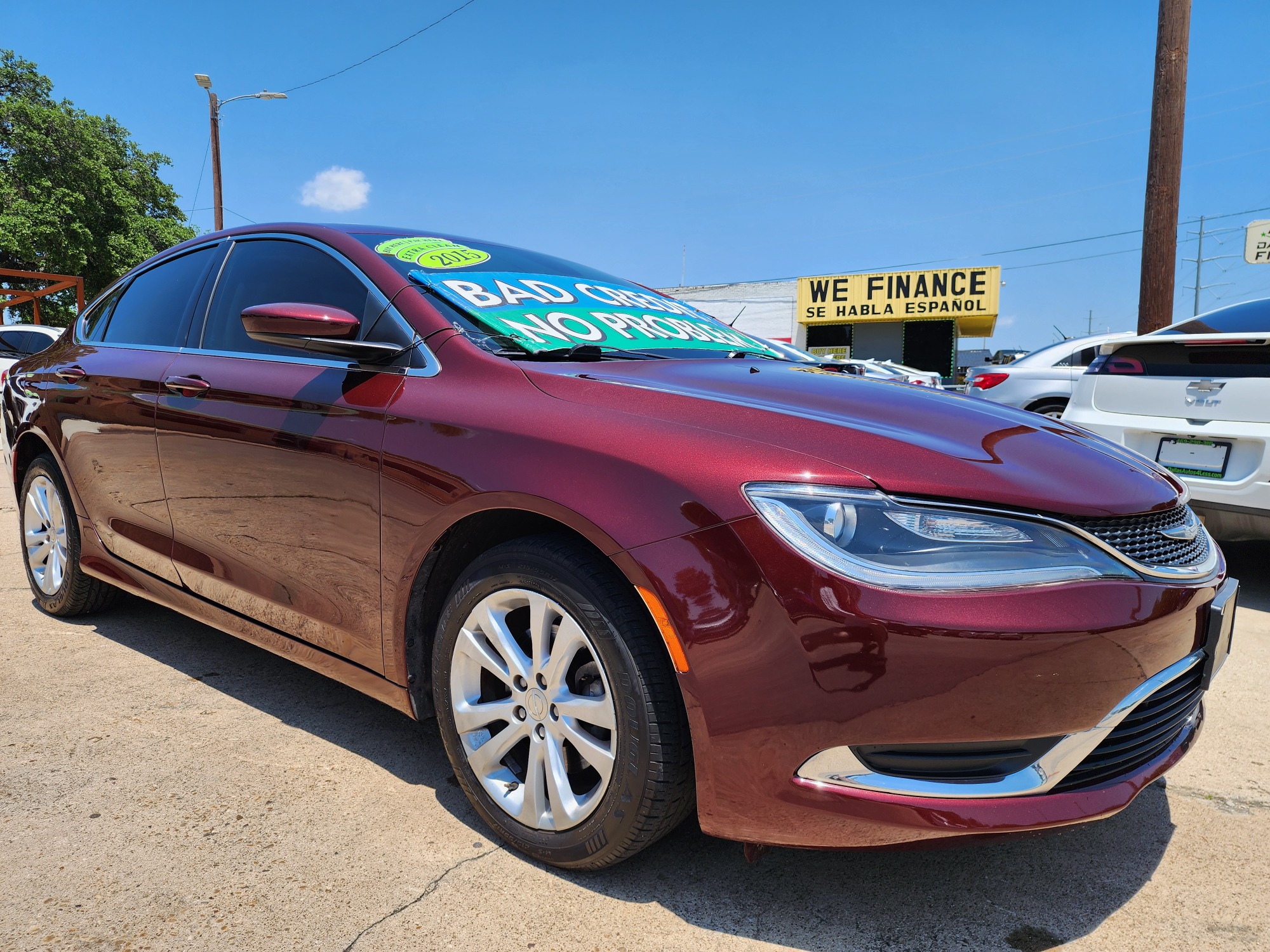2015 Chrysler 200 Limited (1C3CCCABXFN) with an 2.4L L4 DOHC 16V engine, 9-Speed Automatic transmission, located at 2660 S.Garland Avenue, Garland, TX, 75041, (469) 298-3118, 32.885387, -96.656776 - Welcome to DallasAutos4Less, one of the Premier BUY HERE PAY HERE Dealers in the North Dallas Area. We specialize in financing to people with NO CREDIT or BAD CREDIT. We need proof of income, proof of residence, and a ID. Come buy your new car from us today!! This is a very well cared for 2015 Ch - Photo #1